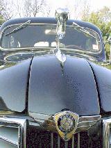 48k photo of 1937 Dodge 4-door Trunkback (Touring) Sedan, ram and badge