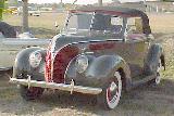 32k photo of 1938 Ford DeLuxe Club Cabriolet