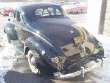 16k photo of 1940 Ford V8 DeLuxe opera coupe