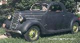 48k photo of 1935 Ford DeLuxe 3-window coupe of Aubrey Bruneau