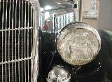 47k photo of 1935 Ford DeLuxe convertible sedan, headlight