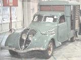 107k photo of early Peugeot 402 horse delivery box van?
